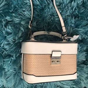 White and tan handbag/ over the shoulder bag.